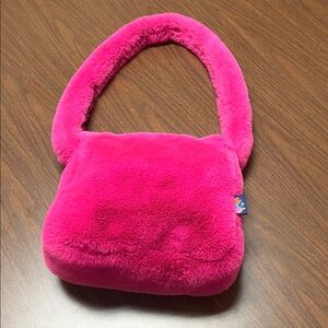 UNIF Faye bag in hot pink faux fur